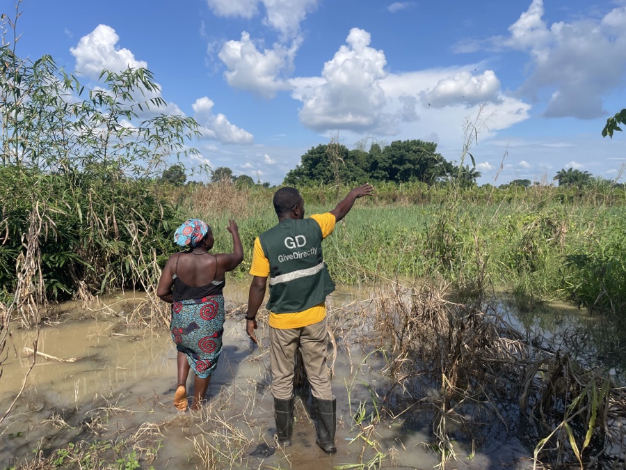 Adi Musa with her flooded farmland in Nigeria