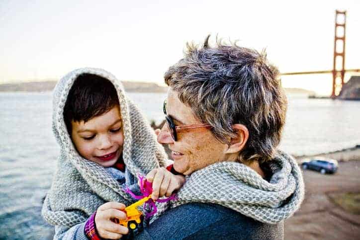 child and women on beach in San Francisco